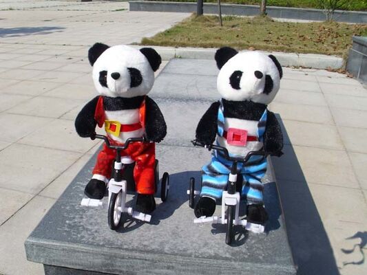 100% PP Cotton Musical Plush Toys , Electronic Bicycle Animal Panda Soft Toy